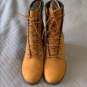New high heel women’s timberland boots size 9.